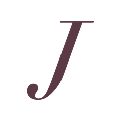 The JENN J mark, its curve shaped like a womb